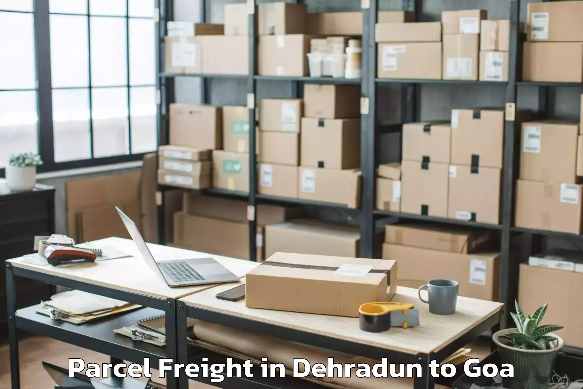 Professional Dehradun to Saligao Parcel Freight